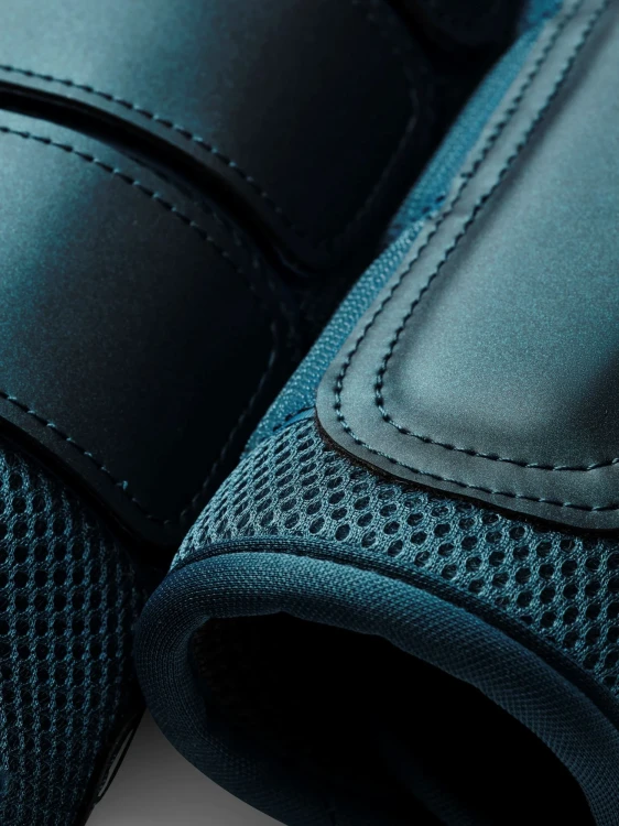 teal_brushing_boots_2.webp